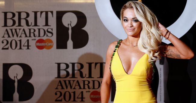 British singer-songwriter Rita Ora poses on the red carpet after arriving at the BRIT Awards in London on Wednesday.   AFP-Yonhap
