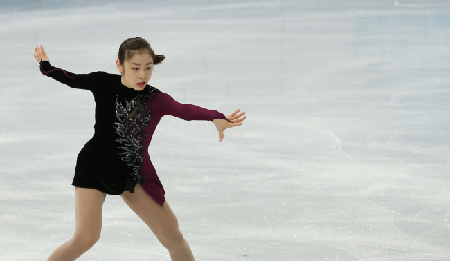 김연아(스케이트선수)
SOCHI, Russia (Yonhap) ― South Korean figure skater Kim Yu-na went through a mostly smooth dress rehearsal on Thursday, her final run-through of the free skating program scheduled for later in the day.
Korea’s Kim Yu-na rehearses ahead of the free-skate program in Sochi, Russia, Thursday.   Yonhap