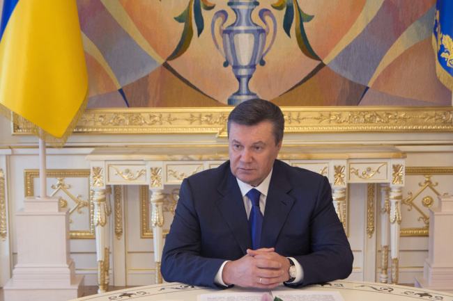 Viktor Yanukovych, Ukraine's president, pauses during an interview in Kiev, Ukraine, on Tuesday, July 12, 2012. Ukraine's economy grew 2 percent from a year earlier in the first quarter, the State Statistics Service said, revising up its initial estimate of 1.8 percent expansion. Photographer: Vincent Mundy/Bloomberg *** Local Caption *** Viktor Yanukovych