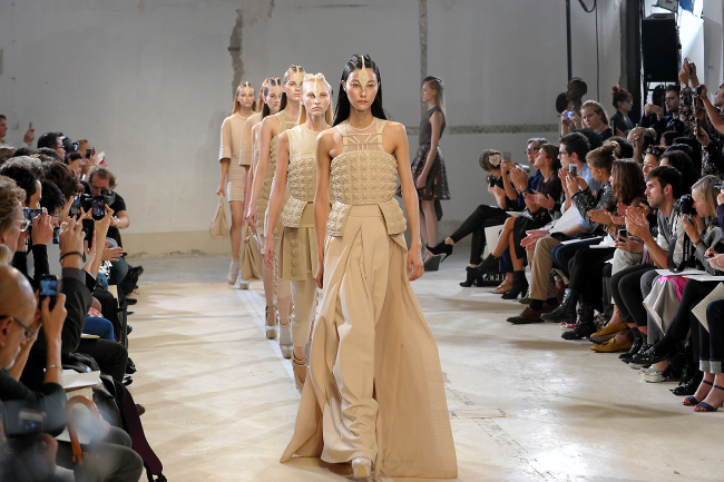Models wear items from the hexa by kuho spring-summer 2014 collection at Paris Fashion Week last year.   Samsung Everland