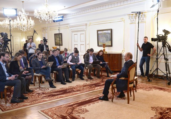 Russian President Vladimir Putin gives a news conference at his country residence of Novo-Ogaryova, outside Moscow, Tuesday.    AFP-Yonhap