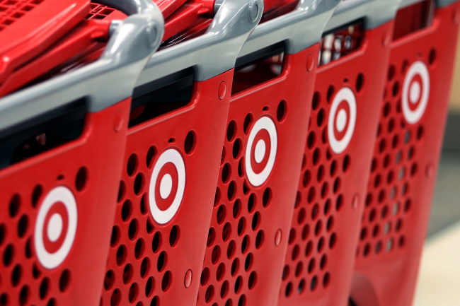 Target Corp. logos are seen on shopping carts inside a new store in Chicago, Illinois.   Bloomberg
