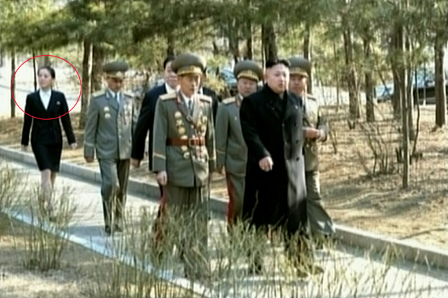 Kim Yo-jong (circled) is seen at Kim Il-sung University of Politics in Pyongyang on Sunday.   Yonhap
