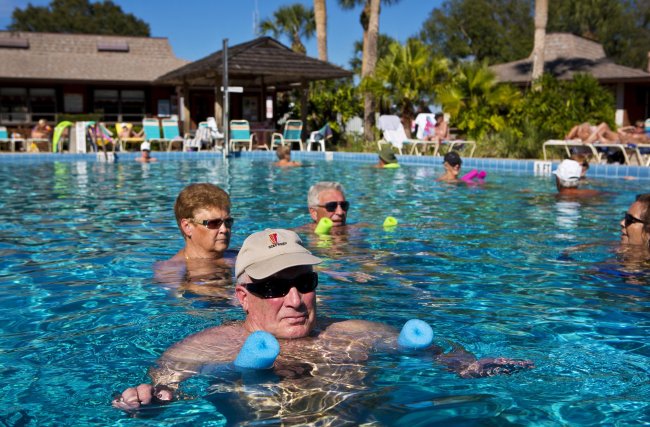 Jim Walker from upstate New York relaxes in one of the swimming pools at Cypress Cove Nudist Resort & Spa on Feb. 19. Orlando Sentinel/MCT