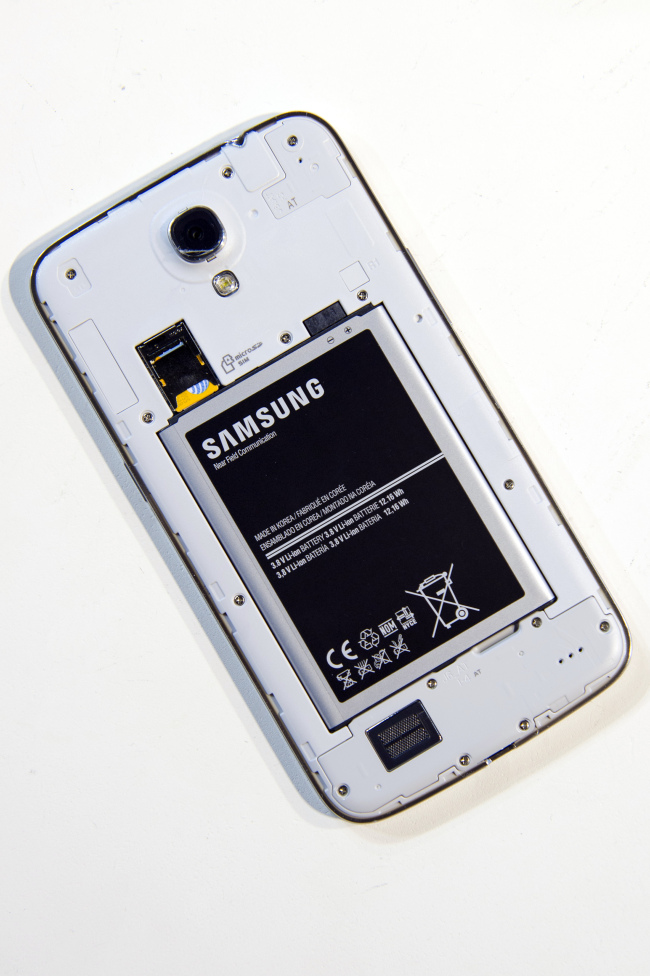 The back of the Samsung’s Galaxy Mega phone showing the battery is displayed for a photograph.
