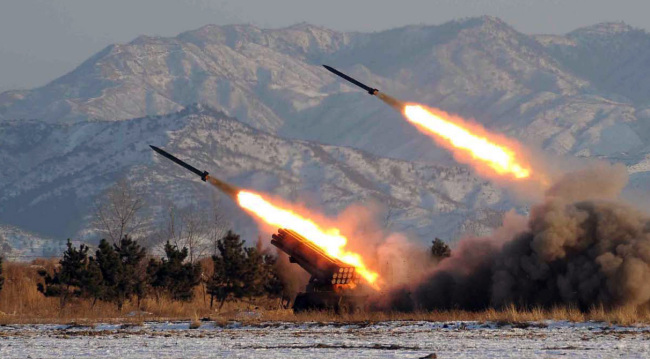 North Korean troops engage in a live-fire exercise, the North’s official Korean Central News Agency reported in January 2009.   Yonhap
