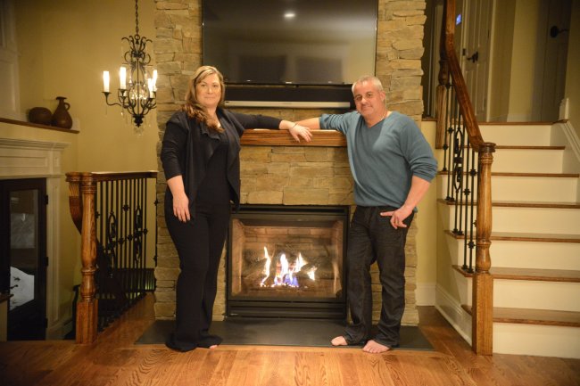 Vikki and John Ruisch put in two fireplaces when they had their house renovated in 2013, one in the master bedroom and another in the living room.   The Record/MCT