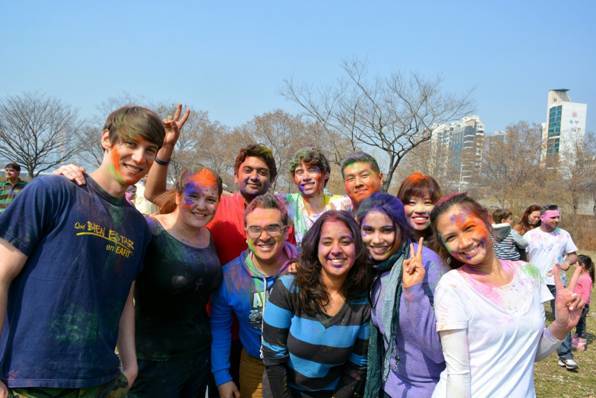 Revelers pose during the IIK Holi Dhamaka 2014 celebration at Hangang Park in Ichon-dong, Seoul.   IIK