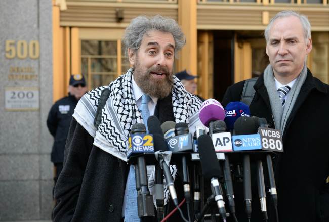 Stanley Cohen (left), the defense lawyer for Osama bin Laden’s son-in-law Sulaiman Abu Ghaith, answers questions from reporters outside the Manhattan federal court in New York on Wednesday.   AFP-Yonhap