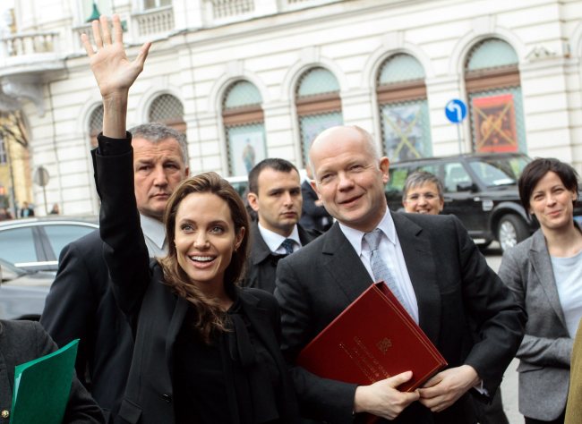 U.S. actress Angelina Jolie (left) and British Foreign Secretary William Hague (right) during the their visit to the Srebrenica Memorial Center of Potocari, near Srebrenica, Bosnia and Hercegovina, Friday.   EPA-Yonhap