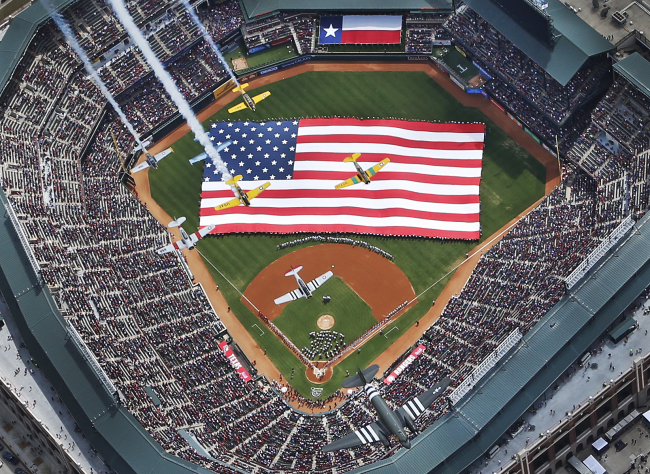 Ceremonies mark opening day before a baseball game between the Texas Rangers and the Philadelphia Phillies in Arlington, Texas, Monday.   AP-Yonhap