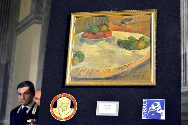 A Paul Gauguin still life recovered by authorities is shown during a press conference in Rome on Wednesday.   AP-Yonhap