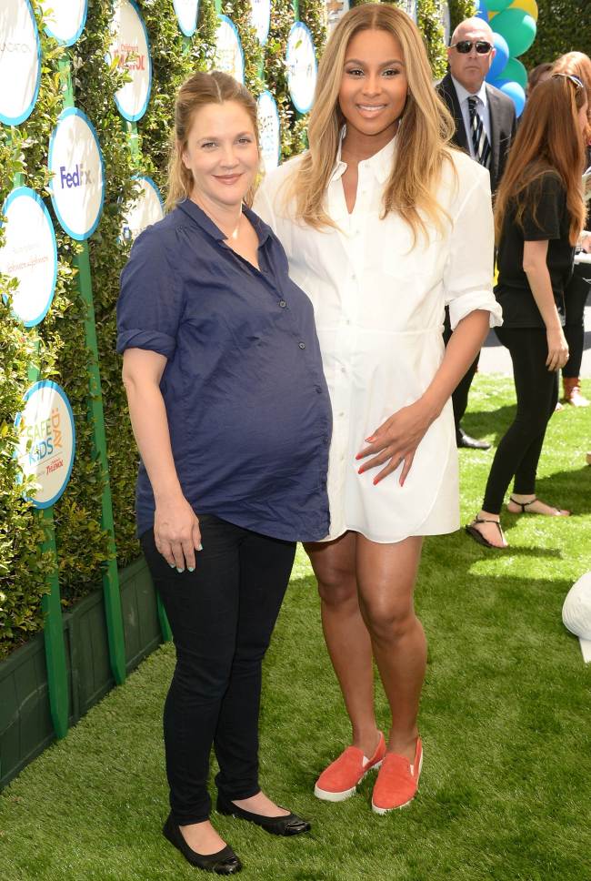 Actress Drew Barrymore (left) and singer Ciara attend the Safe Kids Day at The Lot in West Hollywood, California, April 5.   AP-Yonhap