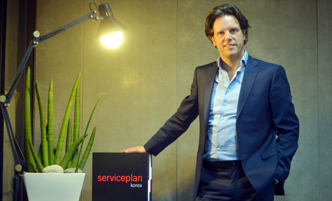 Serviceplan group CEO Florian Haller poses for The Korea Herald at Serviceplan Korea’s office in Itaewon-dong, Seoul.    Kim Myung-sub/The Korea Herald