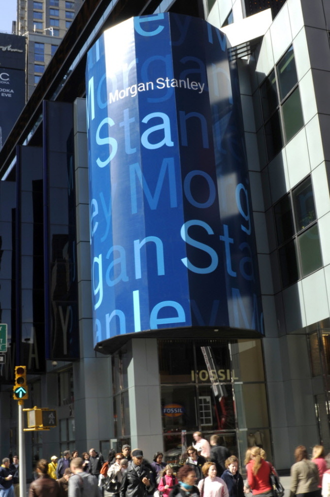 Pedestrians walk past Morgan Stanley’s headquarters in New York.  Bloomberg