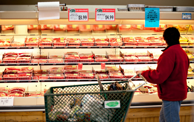 A customer shops for beef at a supermarket in Princeton, Illinois.   Bloomberg