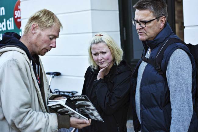 Danish drug addict Henrik sells “Illegal,” a Danish magazine about drugs and drug misuse.   AFP-Yonhap