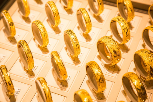 Gold rings for sale at a jewelry store in Hong Kong.   Bloomberg