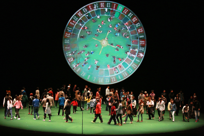 A rehearsal for “100% Gwangju,” in which the cast ― 100 residents of Gwangju ― answer questions from among themselves, the audience and producers, creating a live interactive opinion poll.   Institute of Asian Cultural Development