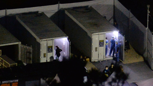 Recovered bodies are moved to a temporary mortuary at Paengmok Port on Jindo Island, South Jeolla Province, Wednesday.   Lee Sang-sub/The Korea Herald