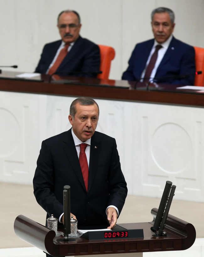 Turkish Prime Minister Recep Tayyip Erdogan addresses the parliament in Ankara on Wednesday.   AP-Yonhap