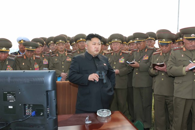 North Korean leader Kim Jong-un offers instructions to his soldiers during an inspection of a long-range artillery unit near the western coast around April 25, the 82nd anniversary of the establishment of the North’s military, according to the Korean Central News Agency.   Yonhap