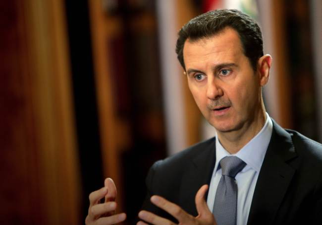 Syrian President Bashar Assad during an interview at the presidential palace in Damascus in January.   AFP-Yonhap