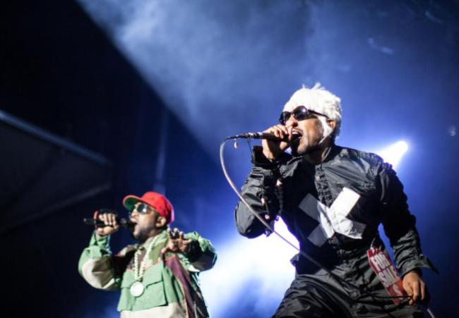 Big Boi (left) and Andre 3000 of Outkast perform at CounterPoint 2014 in Rome, Georgia, Sunday.   AP