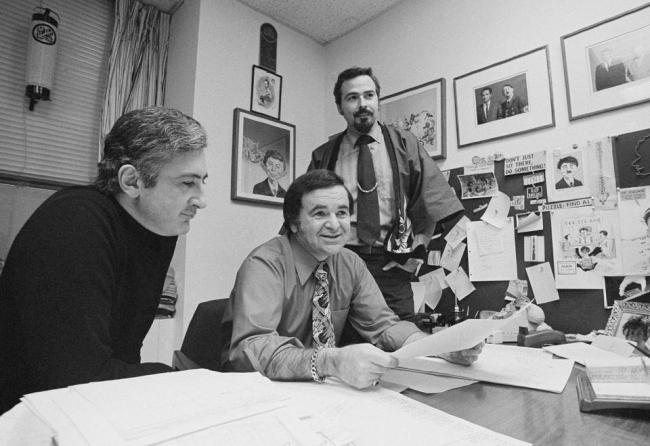 In this 1972 file photo, “Mad” magazine editor Al Feldstein (center), sits with art director John Putnam (left) and a freelancer named Jack, at the magazine’s New York headquarters.   AP