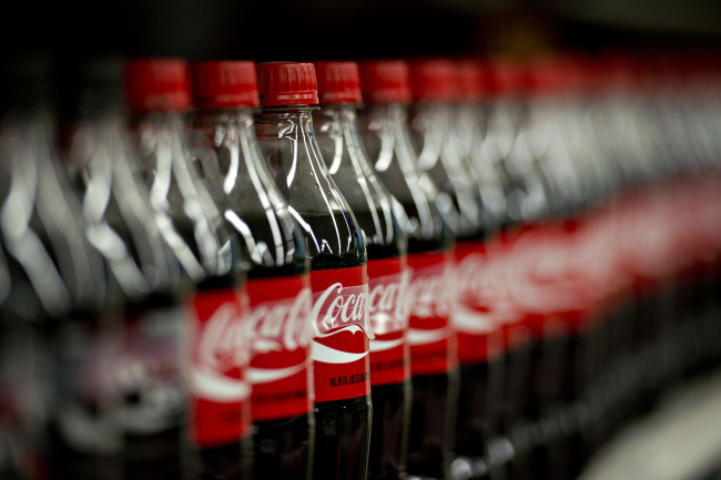 Coca-Cola products sit on display in a supermarket in Princeton, Illinois.    Bloomberg