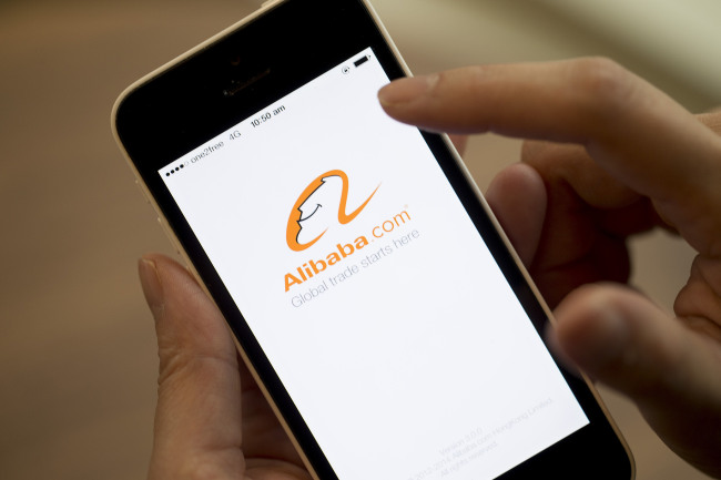 The Alibaba Group logo is displayed on an iPhone in Hong Kong.   Bloomberg