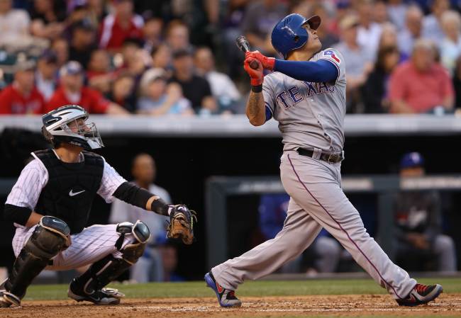 Rangers outfielder Choo Shin-soo singles in the third inning on Tuesday. The Korean went 2 for 3 with a walk.   AFP-Yonhap