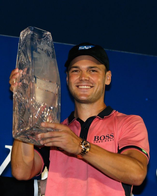 Martin Kaymer celebrates with the winner’s trophy on Sunday. AFP-Yonhap