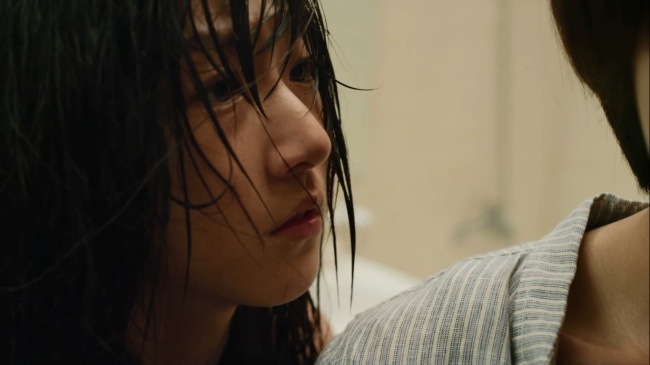 Kim Sae-ron plays an abused child in “A Girl at My Door.”   CGV Movie Collage