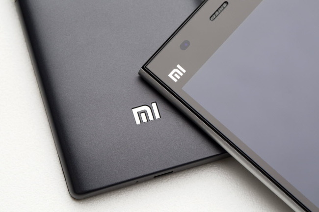 Xiaomi Corp. logos are seen on the smartphones in Hong Kong.   Bloomberg