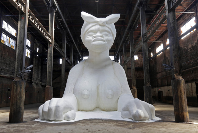 “A Subtlety or the Marvelous Sugar Baby,” by artist Kara Walker, is on display inside the former Domino Sugar Refinery, located in the Williamsburg neighborhood of Brooklyn, New York, Saturday.   AP-Yonhap