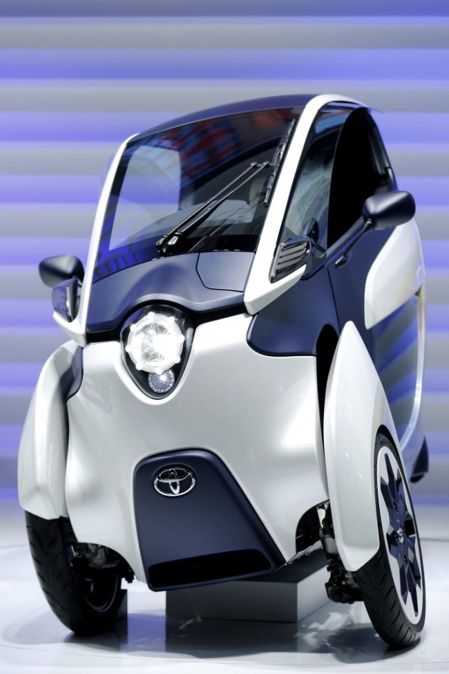 Toyota Motor’s i-ROAD electric personal mobility vehicle    Bloomberg