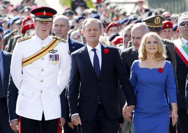 Britain’s Prince Harry (left), Polish Prime Minister Donald Tusk and his wife Malgorzata arrive to attend a commemoration service on the 70th anniversary of the Montecassino battle of World War II at Montecassino’s Polish military cemetery, Italy, Sunday.   AP-Yonhap