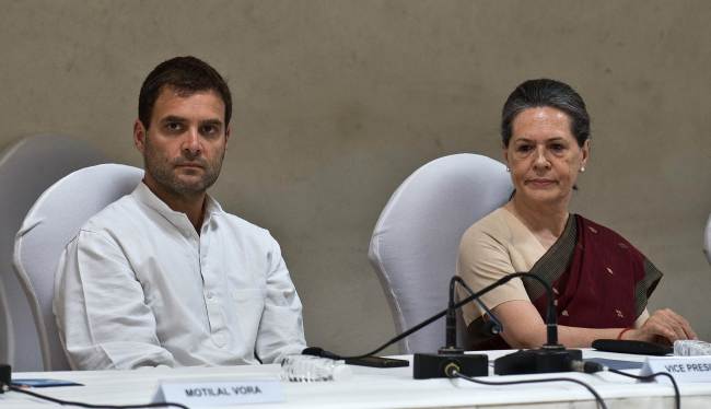 Congress party President Sonia Gandhi (right) and Vice President Rahul Gandhi attend the Congress Working Committee meeting in New Delhi on Monday.   AFP-Yonhap