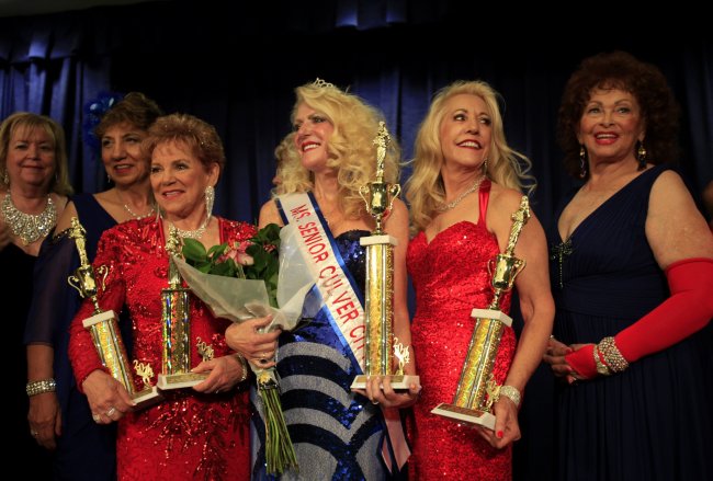 Judie McAskill (from left), Alma Gamez, Sandra Miller-Erkus, Gayla Kalp-Jackson, Elaine Brammell and Gail Stebbins participate in the Ms. Senior California pageant at the Culver City Senior Center in Culver City, California, on May 4. Kalp-Jackson, 66, holds the winner’s trophy.   Los Angeles Times/MCT