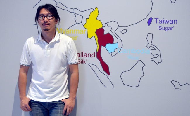 Artist Lee Wan poses in front of his work exhibited at Leeum, Samsung Museum of Art, Tuesday.   Kim Myung-sub/The Korea Herald