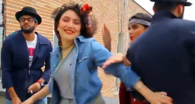 In this frame grab taken from a video posted to YouTube, people dance to Pharrell Williams’ hit song “Happy” on a rooftop in Tehran, Iran.   AP-Yonhap