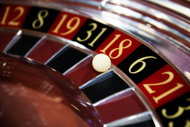 A ball sits on a roulette wheel in the Cammegh booth at the Global Gaming Expo in the Venetian Macao resort and casino in Macau, China, Tuesday.   Bloomberg