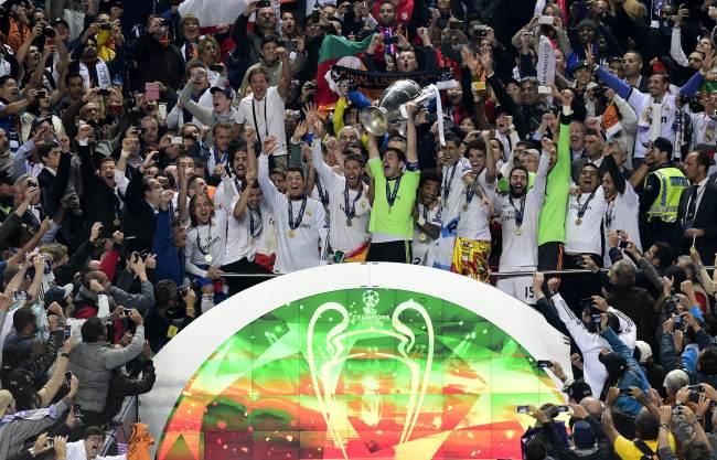 Real Madrid players and fans celebrate their Champions League victory on Saturday.   AFP-Yonhap
