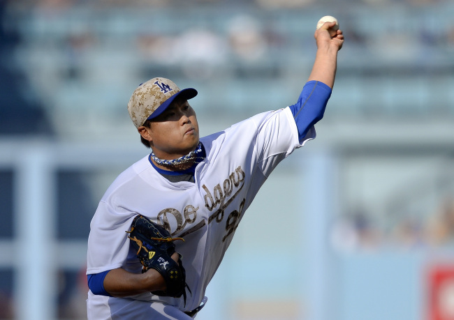 Los Angeles Dodgers starting pitcher Ryu Hyun-jin delivers in the first inning on Monday.   AP-Yonhap