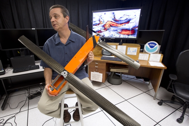 Joe Cione displays a drone for hurricane research.   AP-Yonhap