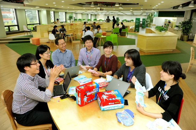 Yuhan-Kimberly employees hold a meeting at the company headquarters in Seoul.   Yuhan-Kimberly