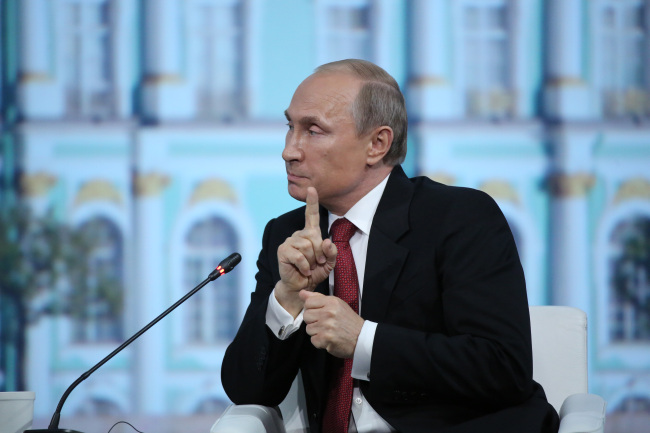 Vladimir Putin, Russia’s president, speaks during the plenary session of the St. Petersburg International Economic Forum in St. Petersburg, Russia, May 23.    Bloomberg
