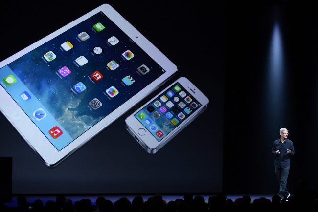 Apple CEO Tim Cook introduces the new iOS 8 at the Apple Worldwide Developers Conference in San Francisco on Monday.   EPA-Yonhap