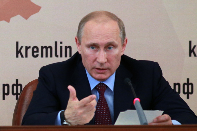 Russian President Vladimir Putin speaks at a meeting of the Presidential Council for Local Self-Government Development.   ITAR-TASS-Yonhap